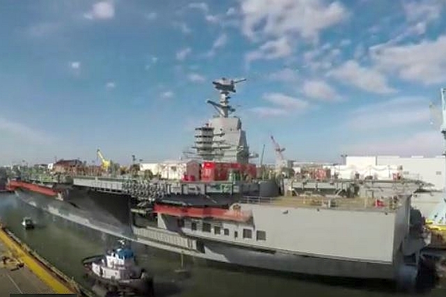 Huntington Ingalls’ Launches Aircraft Carrier, John F Kennedy into Water