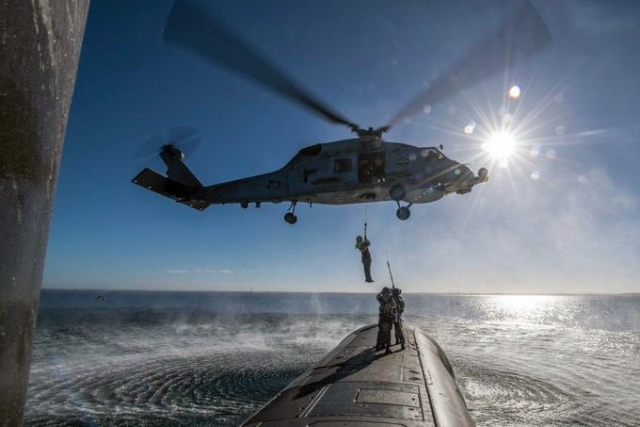 Chinese Fighter Jet Releases Flares in the Path of an Australian Maritime Helicopter