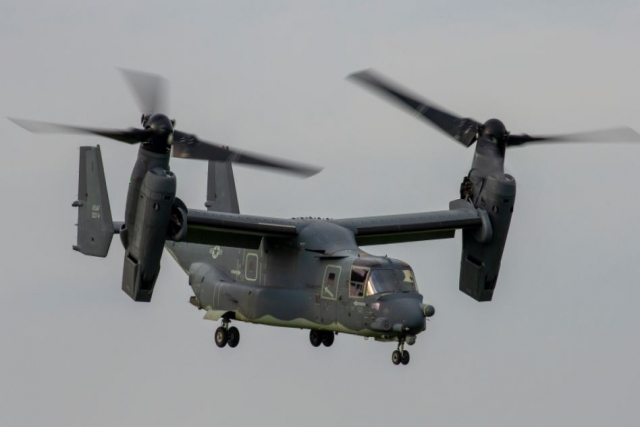 U.S. CV-22 Aircraft Seen Flying over Tokyo with Machine Gun Pointing Downwards